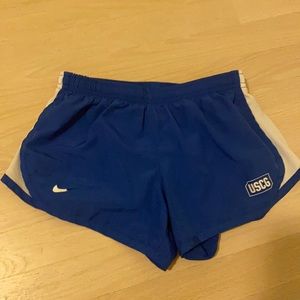 Nike blue shorts.